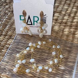 14k gold covered earring and pearl bracelet.